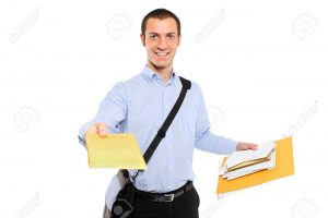 7322369-A-young-postman-delivering-mail-isolated-on-white-background-Stock-Photo