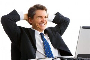 happy-man-looking-at-computer-300x203